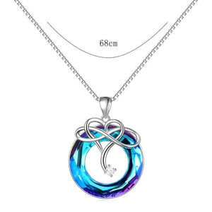 Ensemble de collier et de boucles d'oreilles en cristal d'amour infini